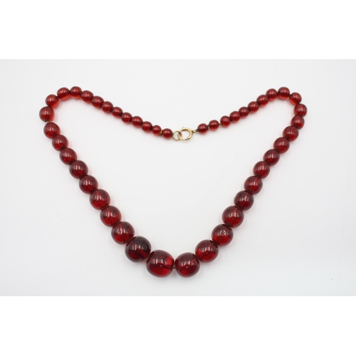 144 - A vintage cherry prystal bakelite necklace - approx. 44cm long and gross weight 32 grams