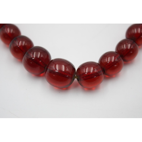 144 - A vintage cherry prystal bakelite necklace - approx. 44cm long and gross weight 32 grams