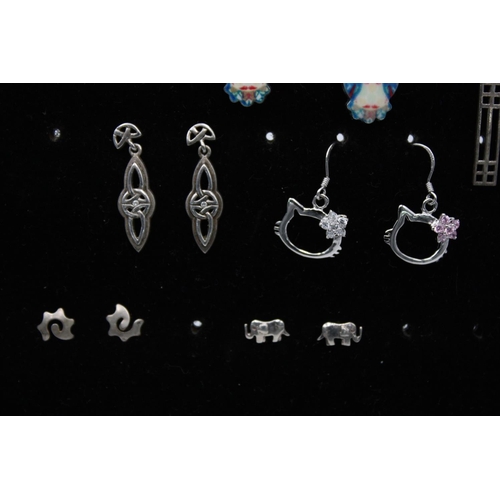 148 - Twelve pairs of vintage 925 sterling silver earrings to include animal, celtic knot - approx. gross ... 