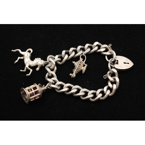 155 - A 925 sterling silver heart padlock horse lamp curb link charm bracelet - approx. gross weight 72 gr... 