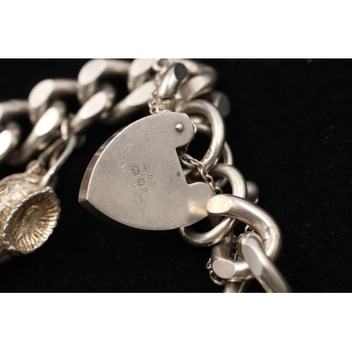 155 - A 925 sterling silver heart padlock horse lamp curb link charm bracelet - approx. gross weight 72 gr... 