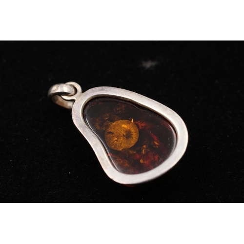 164 - Three 925 sterling silver amber pendants to include cabochon, butterscotch and pear