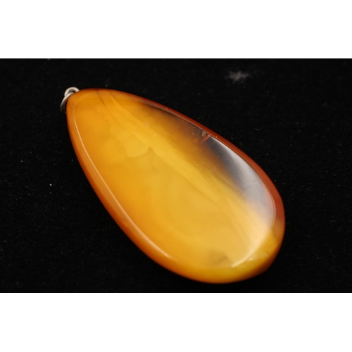 164 - Three 925 sterling silver amber pendants to include cabochon, butterscotch and pear