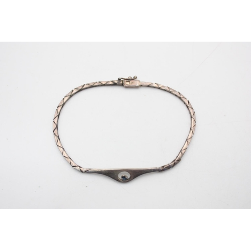 170 - A boxed 925 sterling silver and sapphire bracelet - approx. 19cm long and gross weight 9 grams