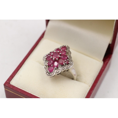 172 - Two vintage 925 sterling silver diamond and ruby rings, one size N½ and one size O - approx. combine... 