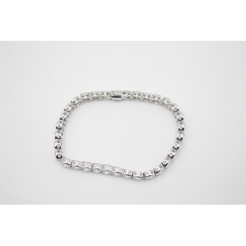 175 - A 925 sterling silver tennis style CZ bracelet - approx. 19cm long