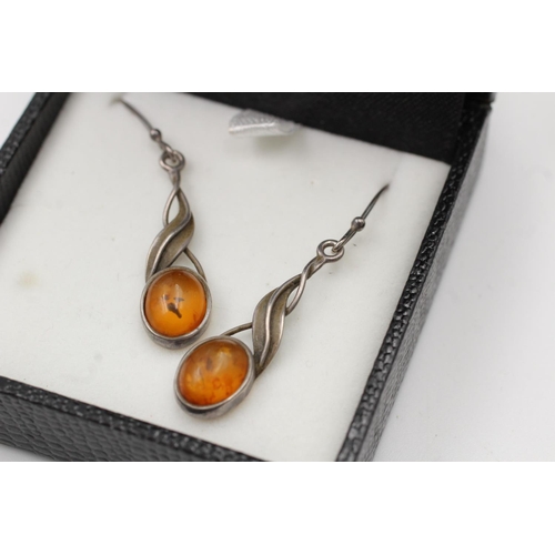 178 - Four boxed pairs of vintage 925 sterling silver and amber earrings