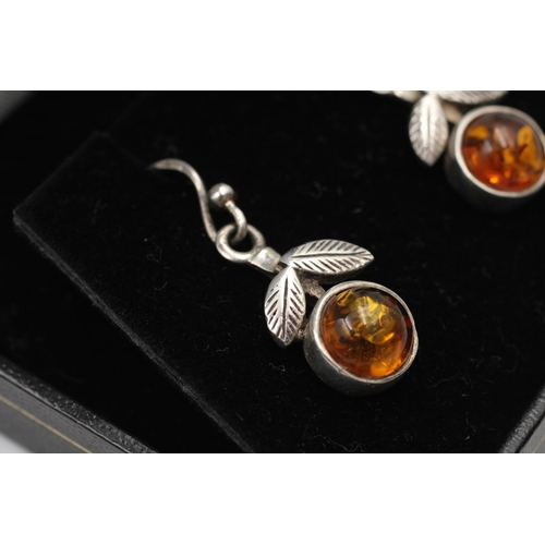 178 - Four boxed pairs of vintage 925 sterling silver and amber earrings