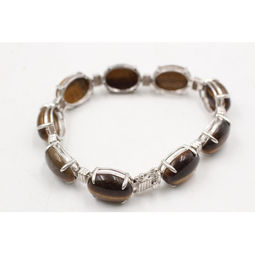 184 - A boxed 925 sterling silver tiger's eye oval link bracelet - approx. bracelet length 19cm