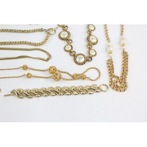 185 - Twenty pieces of 1980s jewellery to include enamel, faux pearl, gold tone etc.