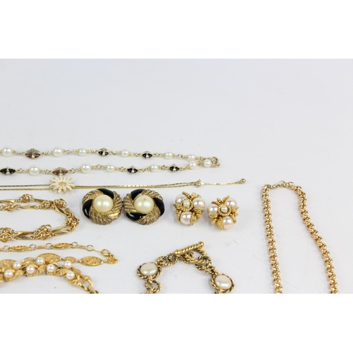 185 - Twenty pieces of 1980s jewellery to include enamel, faux pearl, gold tone etc.