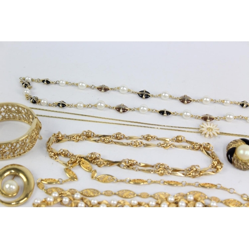 185 - Twenty pieces of 1980s jewellery to include enamel, faux pearl, gold tone etc.