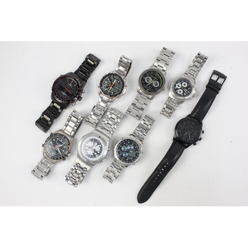 196 - Eight assorted gents sports chronograph wristwatches to include Fossil, Swatch etc.