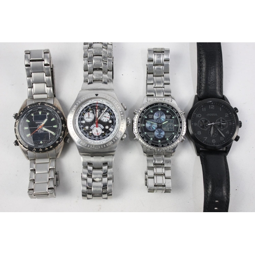 196 - Eight assorted gents sports chronograph wristwatches to include Fossil, Swatch etc.