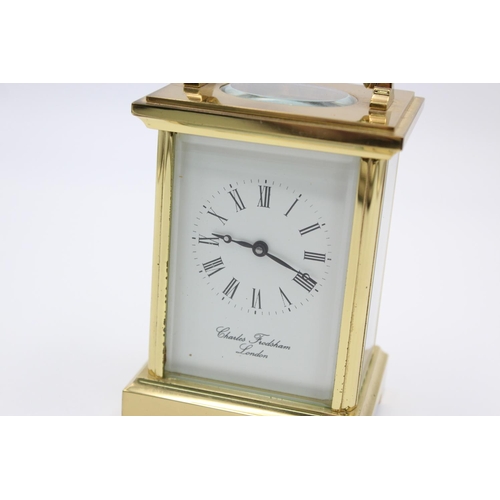 199 - A vintage Charles Frodsham of London heavy brass carriage clock - approx. 11.5cm wide x 8.5cm high