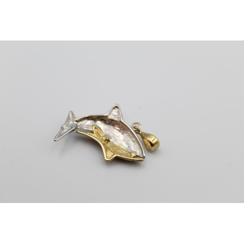 35 - A 14ct gold two-tone shark necklace pendant - approx. gross weight 2.7 grams