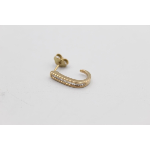 6 - A pair of 9ct gold calibre cut diamond half hoop stud earrings - approx. gross weight 2.5 grams