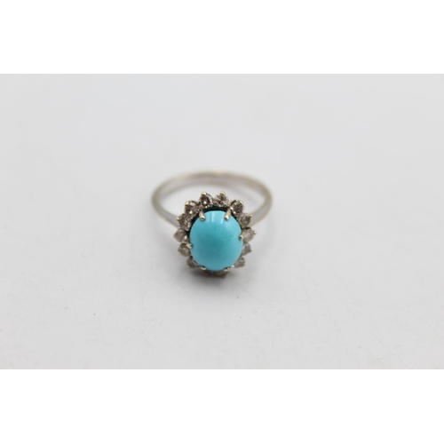 64 - A 12ct gold turquoise and diamond halo set ring, size L½ - approx. 4.2 grams