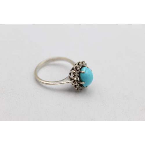 64 - A 12ct gold turquoise and diamond halo set ring, size L½ - approx. 4.2 grams