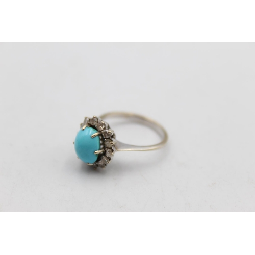 64 - A 12ct gold turquoise and diamond halo set ring, size L½ - approx. 4.2 grams