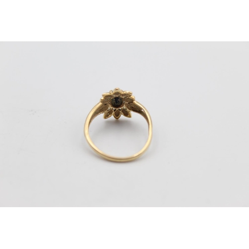 7 - A 9ct gold diamond and gemstone floral design ring, size N - approx. gross weight 1.8 grams