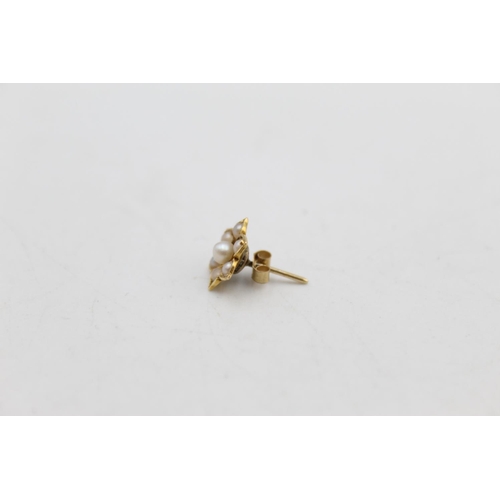 70 - A pair of antique 18ct gold seed pearl floral design stud earrings - approx. gross weight 1.4 grams