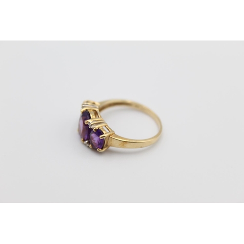 76 - A 10ct gold diamond and amethyst ring, size P - approx. gross weight 2.8 grams