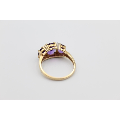 76 - A 10ct gold diamond and amethyst ring, size P - approx. gross weight 2.8 grams