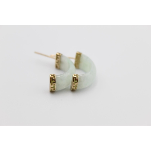 77 - A pair of 9ct gold jade half hoop stud earrings - approx. gross weight 3.8 grams