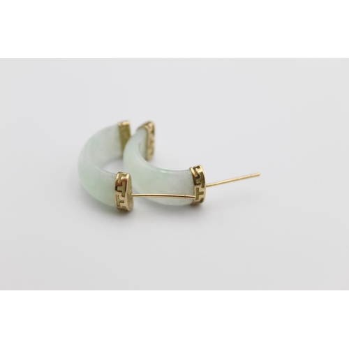 77 - A pair of 9ct gold jade half hoop stud earrings - approx. gross weight 3.8 grams