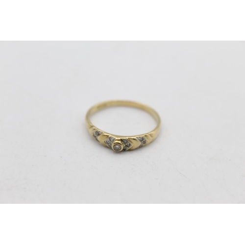 78 - A 9ct gold diamond set ring, size U - approx. gross weight 2.3 grams