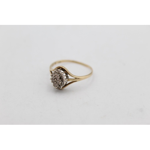 85 - A 9ct gold diamond cluster ring, size P - approx. 1.6 grams