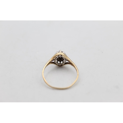 85 - A 9ct gold diamond cluster ring, size P - approx. 1.6 grams