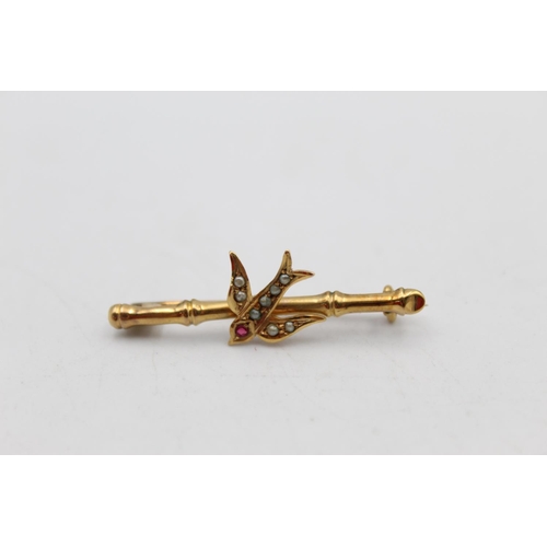 86 - An antique 9ct gold ruby and seed pearl swallow bird bar brooch - approx. gross weight 1.3 grams