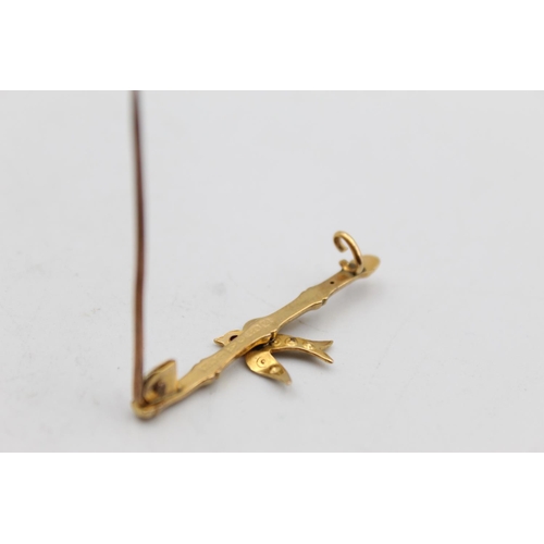 86 - An antique 9ct gold ruby and seed pearl swallow bird bar brooch - approx. gross weight 1.3 grams