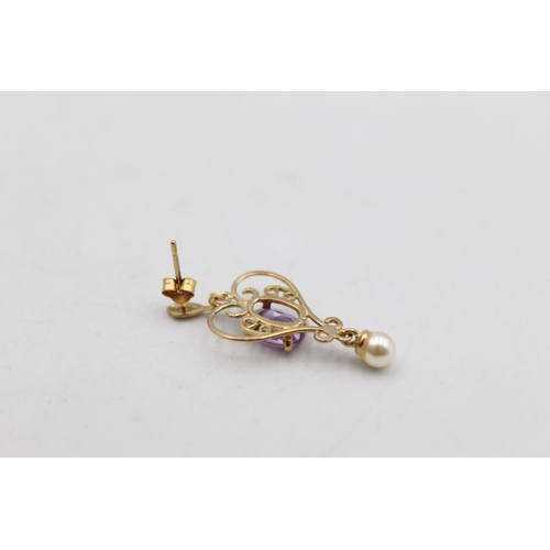 87 - A pair of 9ct gold amethyst and faux pearl drop earrings - approx. gross weight 1.7 grams