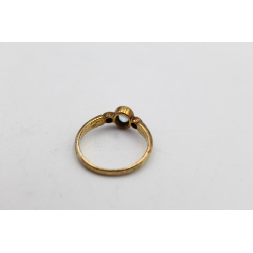 89 - A 9ct gold diamond and gemstone ring, size K - approx. gross weight 1.7 grams