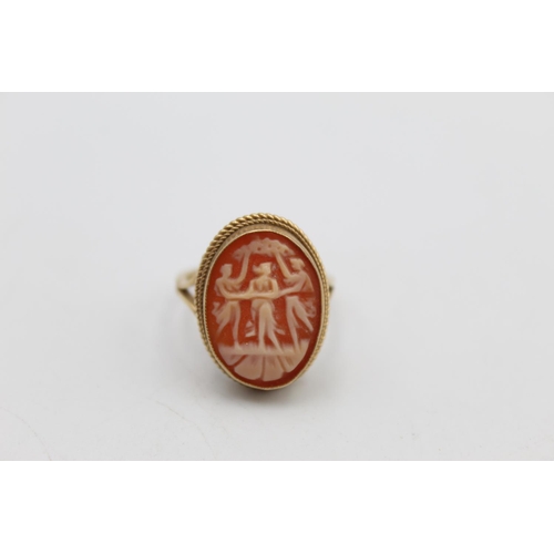 90 - An antique 9ct gold carved shell cameo three graces ring, size N ½ - approx. gross weight 3.9 grams