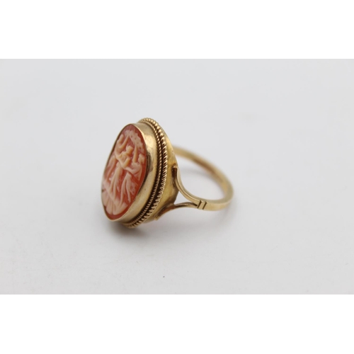 90 - An antique 9ct gold carved shell cameo three graces ring, size N ½ - approx. gross weight 3.9 grams