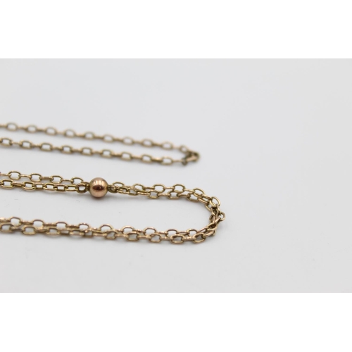 93 - An antique 9ct gold muff chain/necklace conversion - approx. gross weight 9.6 grams