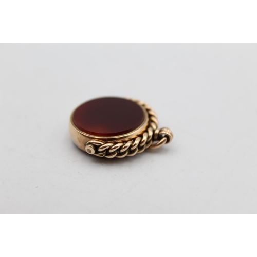 95 - An Edwardian hallmarked 9ct gold gents bloodstone and carnelian swivel fob, dated 1903 - approx. gro... 