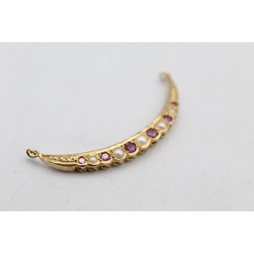 96 - An antique 9ct gold ruby and pearl crescent moon static pendant - approx. gross weight 3.2 grams