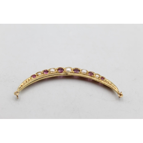 96 - An antique 9ct gold ruby and pearl crescent moon static pendant - approx. gross weight 3.2 grams