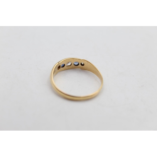 98 - An 18ct gold diamond and sapphire gypsy style ring, size Q - approx. gross weight 2.4 grams