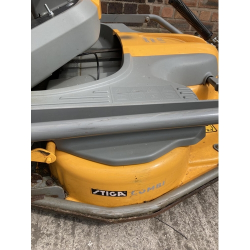 1354 - A yellow and grey Stiga Park Plus Combi Pro 110 ride on articulated lawn mower with Briggs & Stratto... 