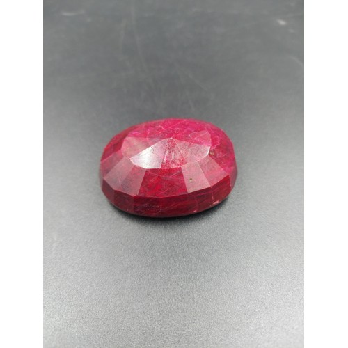 287 - A GLI certified 474ct ruby oval shape gemstone