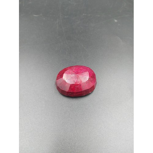 287 - A GLI certified 474ct ruby oval shape gemstone