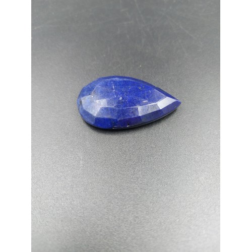 267 - A GLI certified 134ct blue sapphire pear shape gemstone