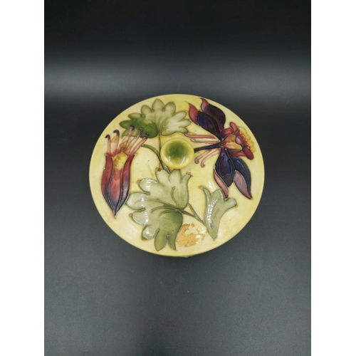 375 - A Moorcroft Columbine pattern circular lidded trinket box - approx. 13cm diameter x 8.5cm high with ... 