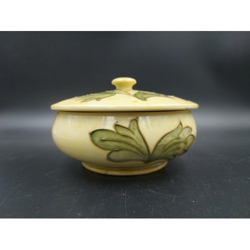 376 - A Moorcroft Columbine pattern circular lidded trinket box - approx. 13cm diameter x 8.5cm high with ... 